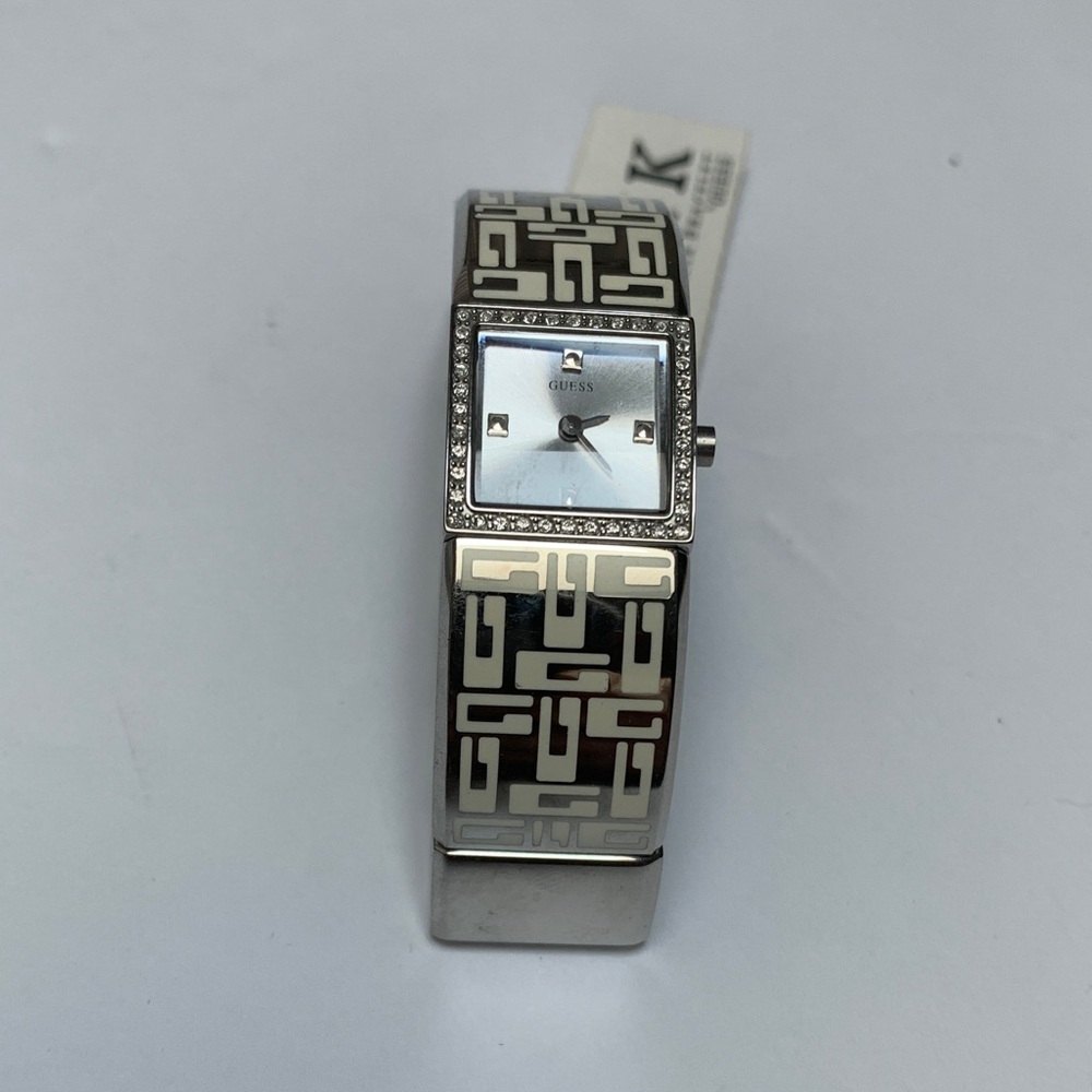 Elegant and Stylish Guess Silver Women's Watch with Geometric Design. Brand new